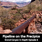 rusted pipeline supported by stone pillar recedes into Grand Canyon Landscape