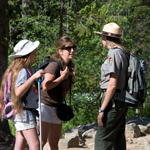 Interpretive ranger with park visitors