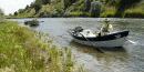 Drift boat on the Bighorn River Drift boat on the Bighorn River