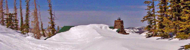 Cedar Breaks Visitor Center covered in snow.