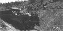 Historic photograph of tourists in the late 1800's fossil hunting near a train Historic photograph of tourists in the late 1800's fossil hunting near a train