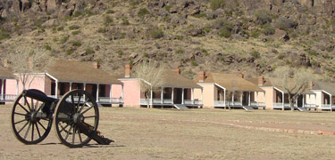 3- Inch Ordnance Rifle on Parade Ground wth Officers Row in the Background