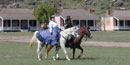 Lady and soldier on horseback Fort Davis NHS. Lady and soldier on horseback Fort Davis NHS.