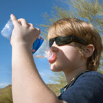 Child drinks water.