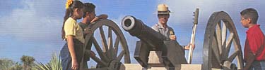 Children learn artillery techniques in an interactive program.
