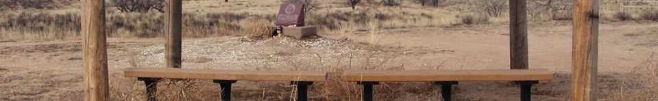 Blankets, hides, and other offerings hang at massacre overlook
