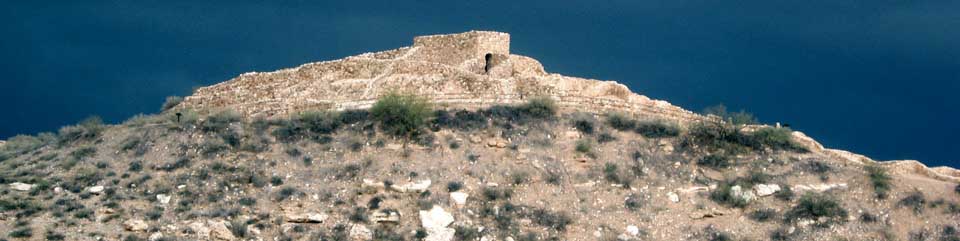 A storm gathers behind the pueblo at Tuzigoot