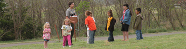 Park Ranger teaching kids a Cheyenne game.