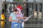 Visitors looking at map