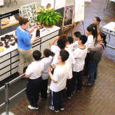 Students learning about archeology at the Independence Living History Center