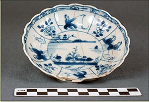 Photograph shows a blue and white Chinese  porcelain saucer discovered at the Dexter Site.