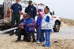 firefighter working with kids