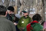 Volunteer Assisting Visitors at Maple Sugar Time
