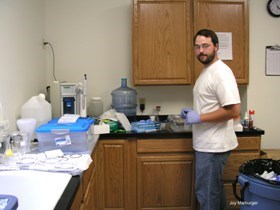 A PhD student from the University of Illinois works on methylmercury research in the GLREC lab.