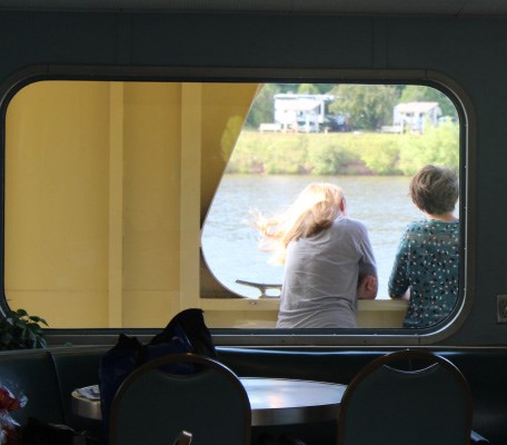 two people looking outward from Ranger III deck