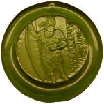 Circular green glass paper weight depicting a standing Powhatan Indian with long bow and text 1607-2007 Jamestown Circular green glass paper weight depicting a standing Powhatan Indian with long bow and text 1607-2007 Jamestown