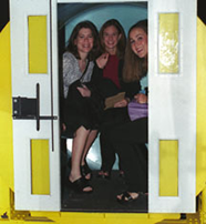 Visitors sitting in tram car
