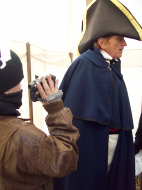 A student reporter films an interview with General Andrew Jackson