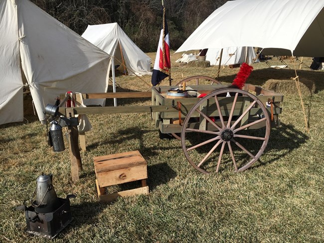1815-era hand cart and other objects used by troops