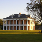 1830s Malus-Beauregard House glows in evening sun