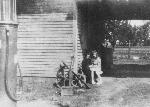 Ms. Lillian in front of store