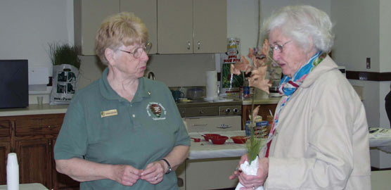 Volunteer with visitor