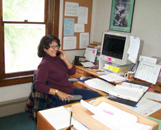 Image of administrator talking on the phone.