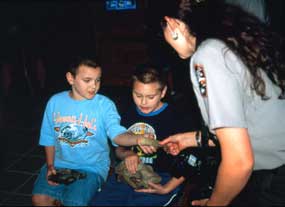 Image of an NPS park ranger talking with some kids.