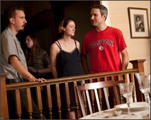 A ranger interpreting objects in the dining room of the JFK birthplace