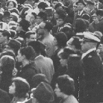 Part of a crowd that assembled at 83 Beals Street after news of the assassination 