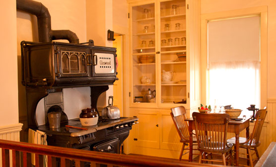 An image of the circa 1917 stove and kitchen table