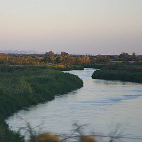 The river Anza saw was reddish brown and much larger.  Modern reservoirs on the Colorado allow sediment to settle upstream and agriculture removed most of the water, so only clear blue water reaches Yuma.