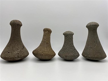 A row of rock tools in an elongated shape
