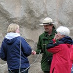 A ranger talks to visitors on the Valley of Ten Thousand Smokes Tour