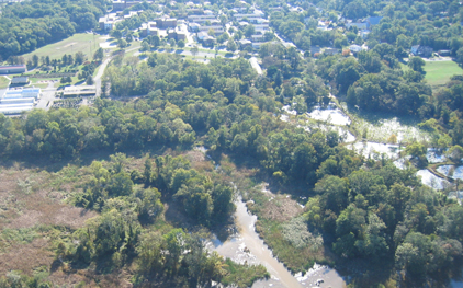 air shot of Anacostia River, marsh and aquatic gardens with houses near by