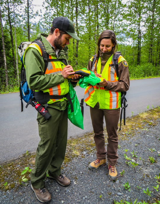 Exotic Plant Management Team members use a GPS to map the location of invasive species.