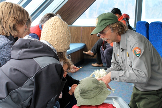 A Kenai Fjords ranger with prospective junior rangers.