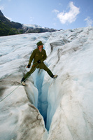 Ranger over glacial crevasse.