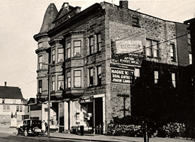 Photo of the Maggie Walz Block on 6th Street in Calumet, circa 1942. Photo of the Maggie Walz Block on 6th Street in Calumet, circa 1942.