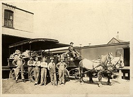 Historic Photo: Lake Superior Produce workers posed for a photo. Circa 1915