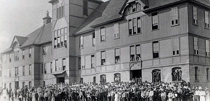 Students pose outside the Old Washington School in Calumet in 1915.