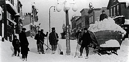 Historic photo of snow removal in Calumet near the corner of Elm and 5th Streets in 1900.