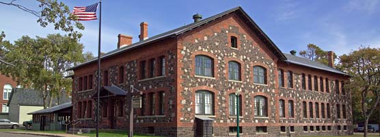 Constructed of brick, waste mine rock and granite, the former general office building for the Calumet & Hecla Company now serves as the park headquarters.