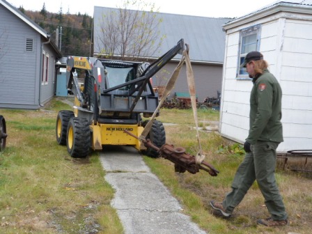 Cory Thole walks the rock drill back toward our collection storage facility.