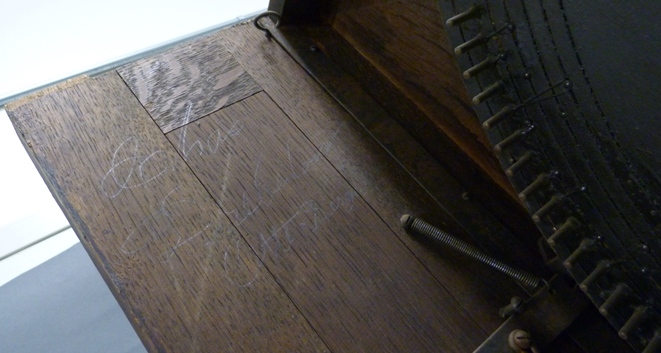 Names inscribed on the slot machine's interior. Names inscribed on the slot machine's interior.