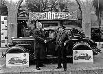 Black and White photo of two men shaking hands