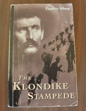 Book cover with text "Tappan Adney" and "The Klondike Stampede"