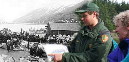 Ranger shows old Dyea photo to visitor