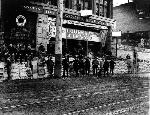 Cooper and Levy storefront with piled supplies