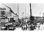 Crowds waiting and boarding ships in Seattle 1897
